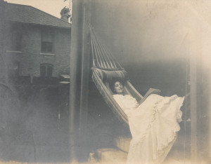 Woman rests in a large hammock